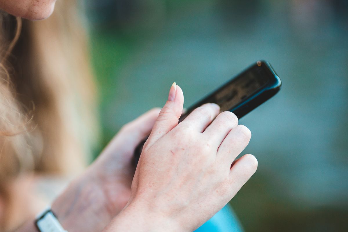 Person holding a smartphone