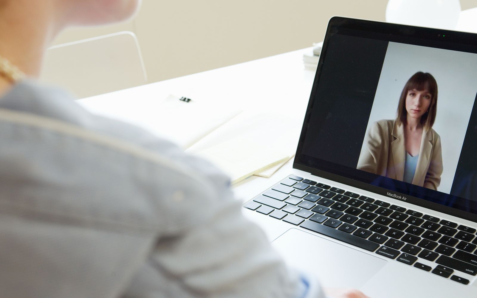 Colleague on a video call in a workspace
